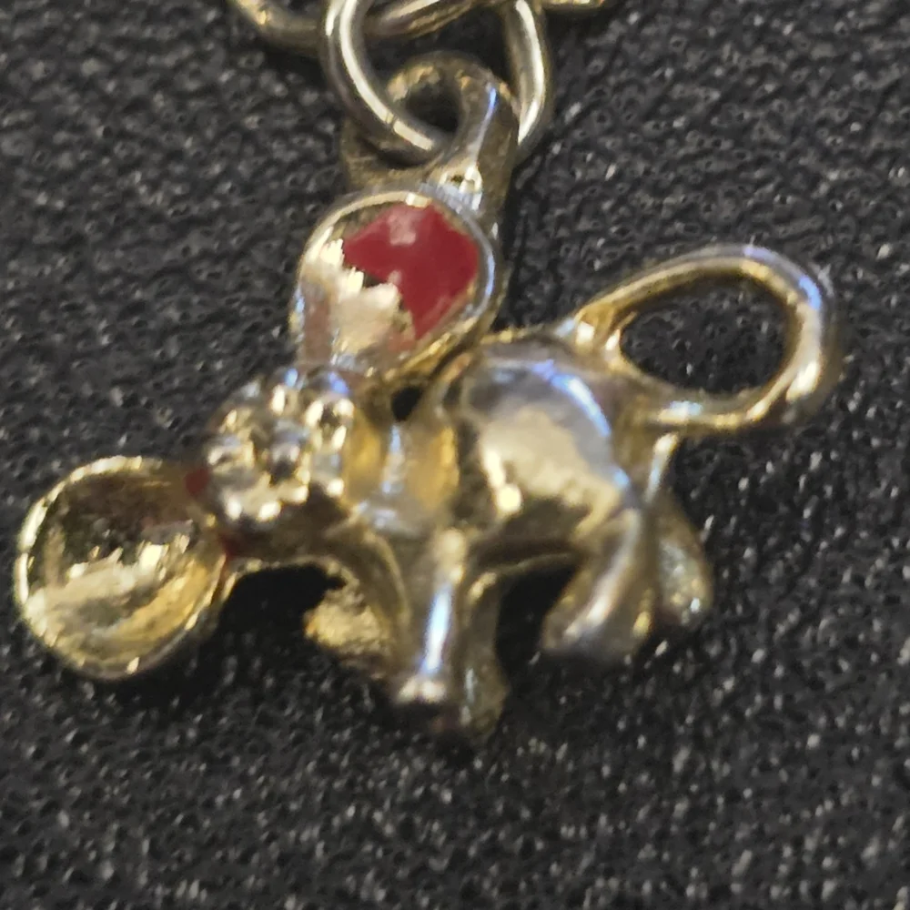 Festive Gold Charm Bracelet with Santa and Colorful Accents